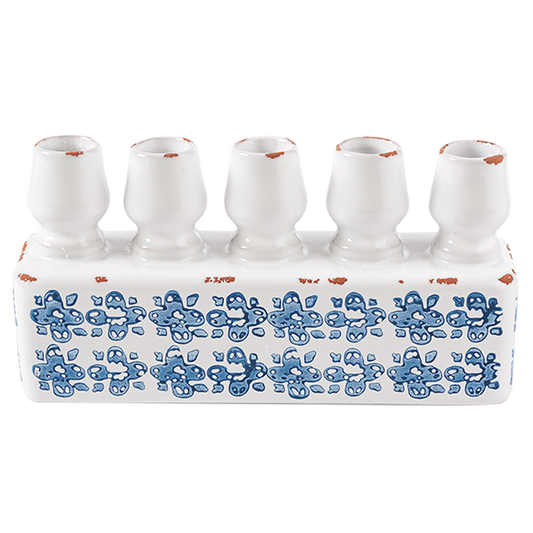 Blue and white stamped candle holder