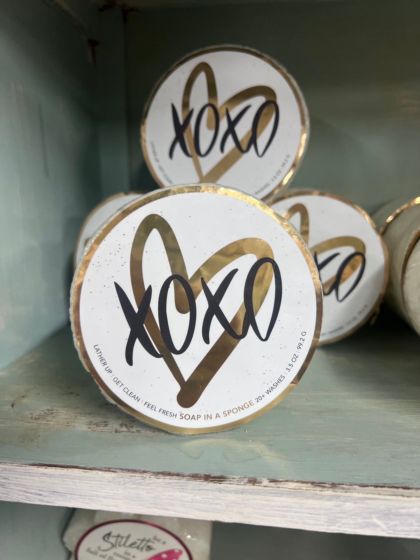 Xoxo soap in a sponge